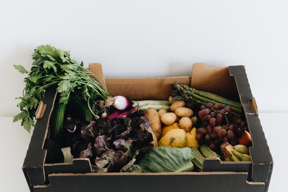 Caisse de fruits et légumes de saison chez un producteur